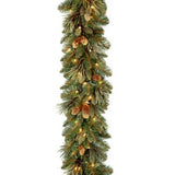 National Tree Company 9' X 10" Carolina Pine Garland with 27 Flocked Cones and 100 Clear Lights